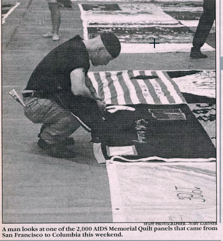 A man looks at one of the 2,000 AIDS Memorial Quilt panels that came from San Francisco to Columbia University. A man looks at one of the 2,000 AIDS Memorial Quilt panels that came from San Francisco to Columbia University.